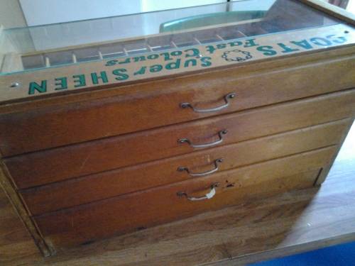 antique coats advertising haberdashery cabinet